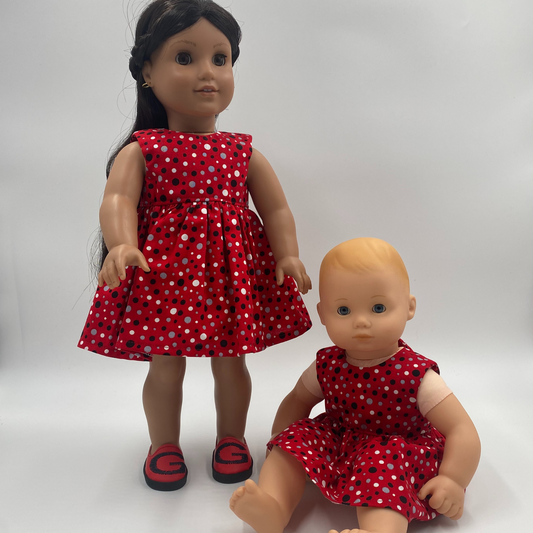 Red dress with silver, black and white dots